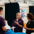Nursing students with their tutor