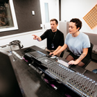 Music students in studio with their tutor