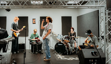 Music students performing in studio