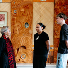 Toi Ohomai students inside Tangatarua Marae talking to Kaitiaki Māori (Wahine)