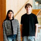 International student standing with a domestic student International student standing with a domestic student