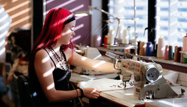 Fashion student working on their garment