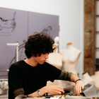 Fashion student working on their garment