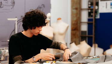 Fashion student working on their garment