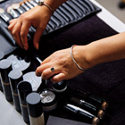 Beauty student choosing makeup 