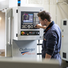 Manufacturing student working on a machine