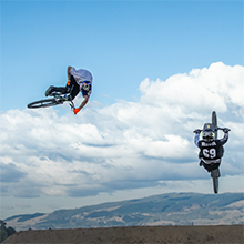 Mountain bikers in mid-air at the Crankworx Festival in Rotorua NZ
