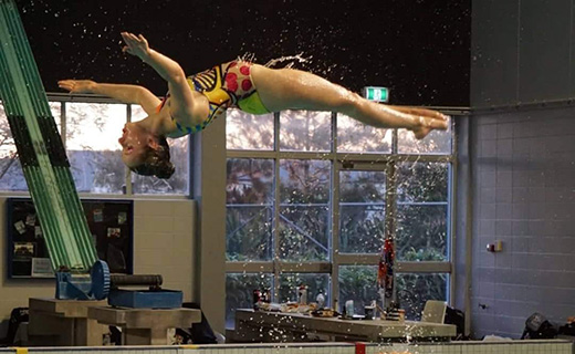 Sychronised swimmer and Toi Ohomai student Isobel Pettit shows off her skills in the pool