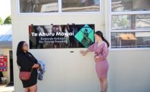 Kharma Verity and Ngairo Baker unveil the new name for Rotorua School for Young Parents - Te Āhuru Mōwai.