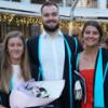 Graduates pose for a photo