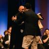 Graduand and tutor hongi